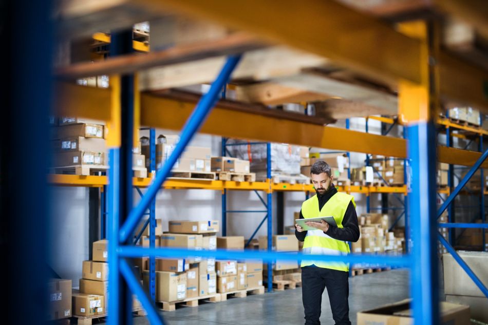 Man Between Pallet Racking