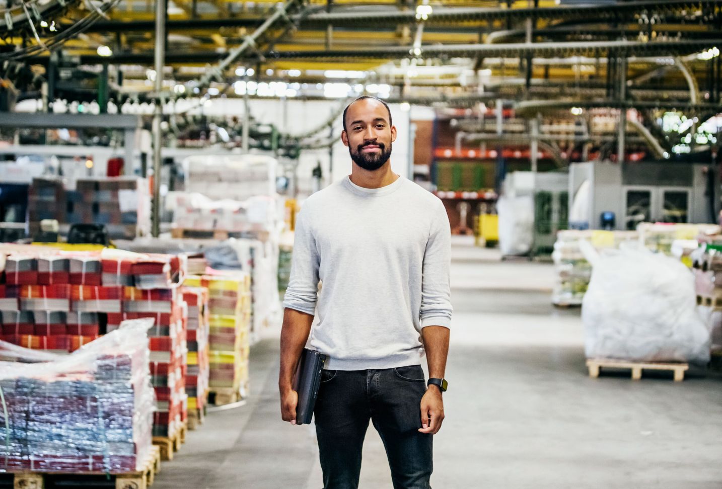 Portrait Of Printery Engineer On Factory Floor